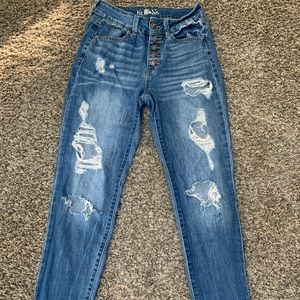 size 0, ripped denim jeans